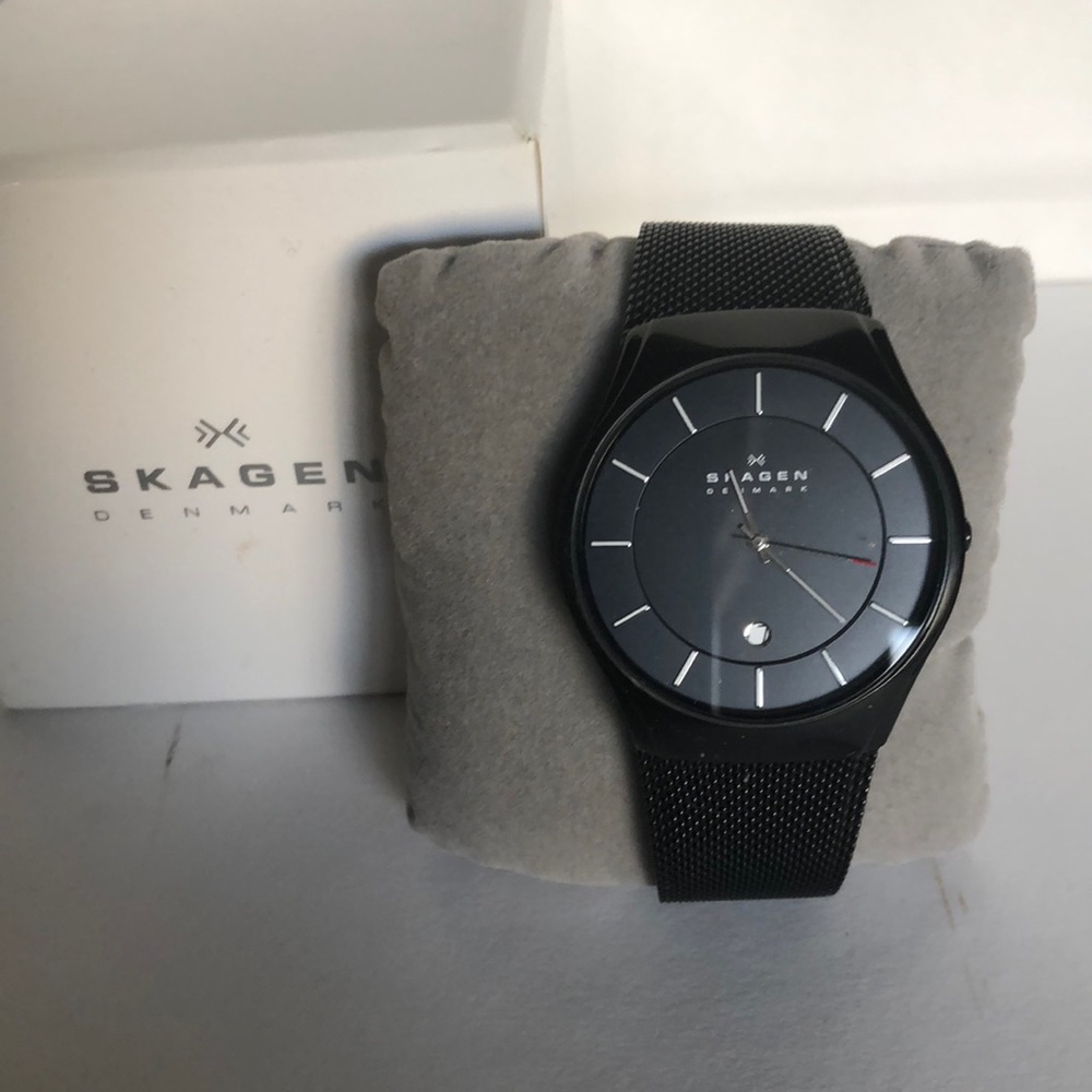 Watch with black mesh band